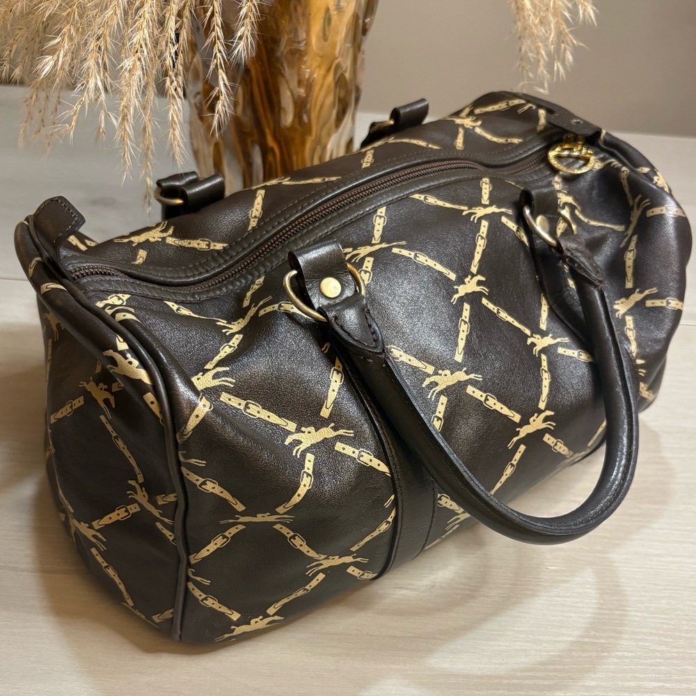 Longchamp Black and‎ Gold Travel Bag